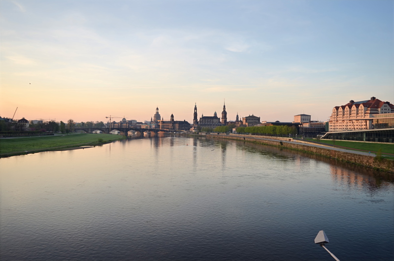 3 - The historic skyline of Dresden, Germany, viewed across the Elbe River toward the Altstadt (Old Town), featuring prominent landmarks like the Frauenkirche and the cathedral tower